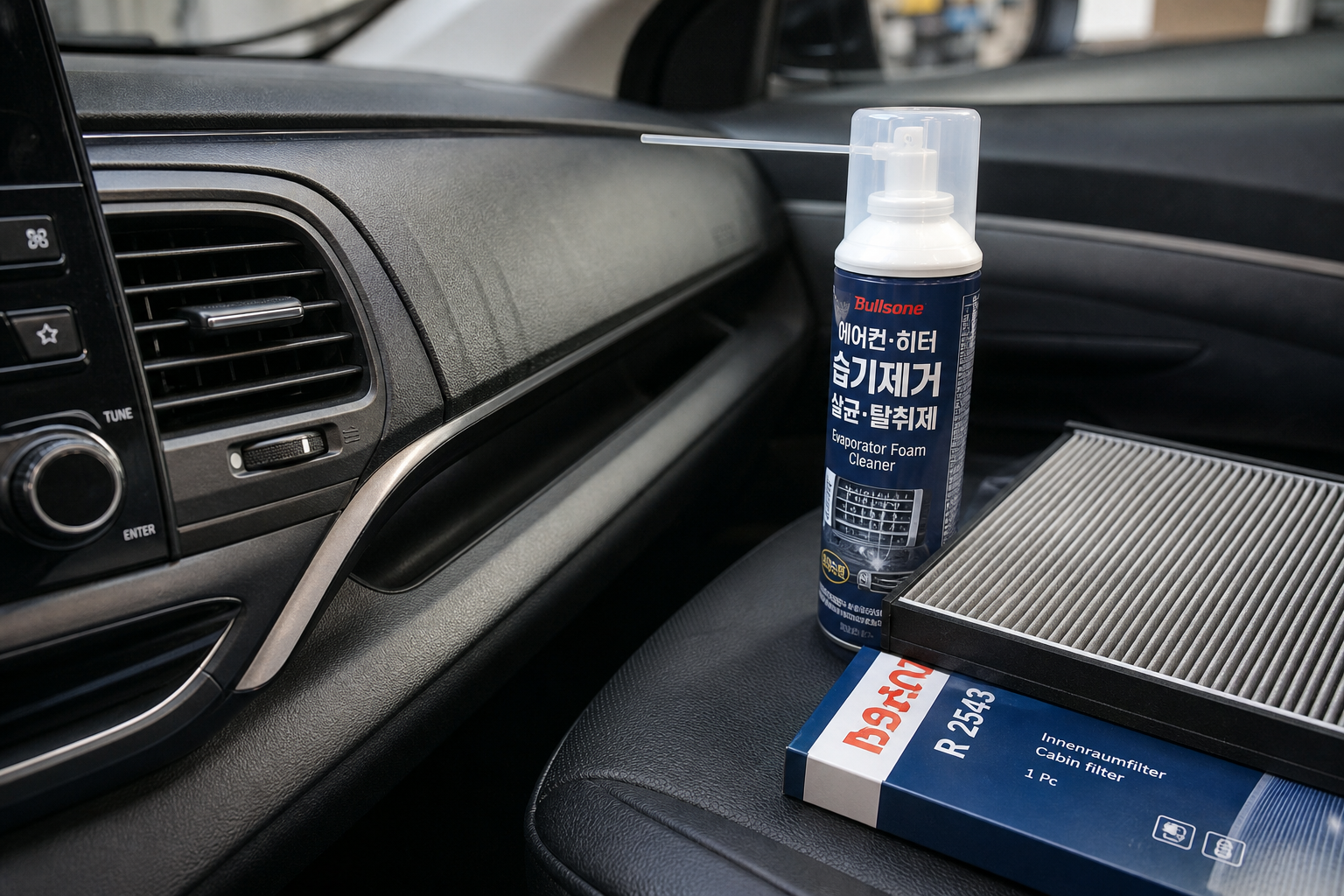 Close-up of a car dashboard vent with an evaporator foam cleaner and a cabin air filter on the passenger seat, clean garage lighting, realistic Korean product-review mood, 4k